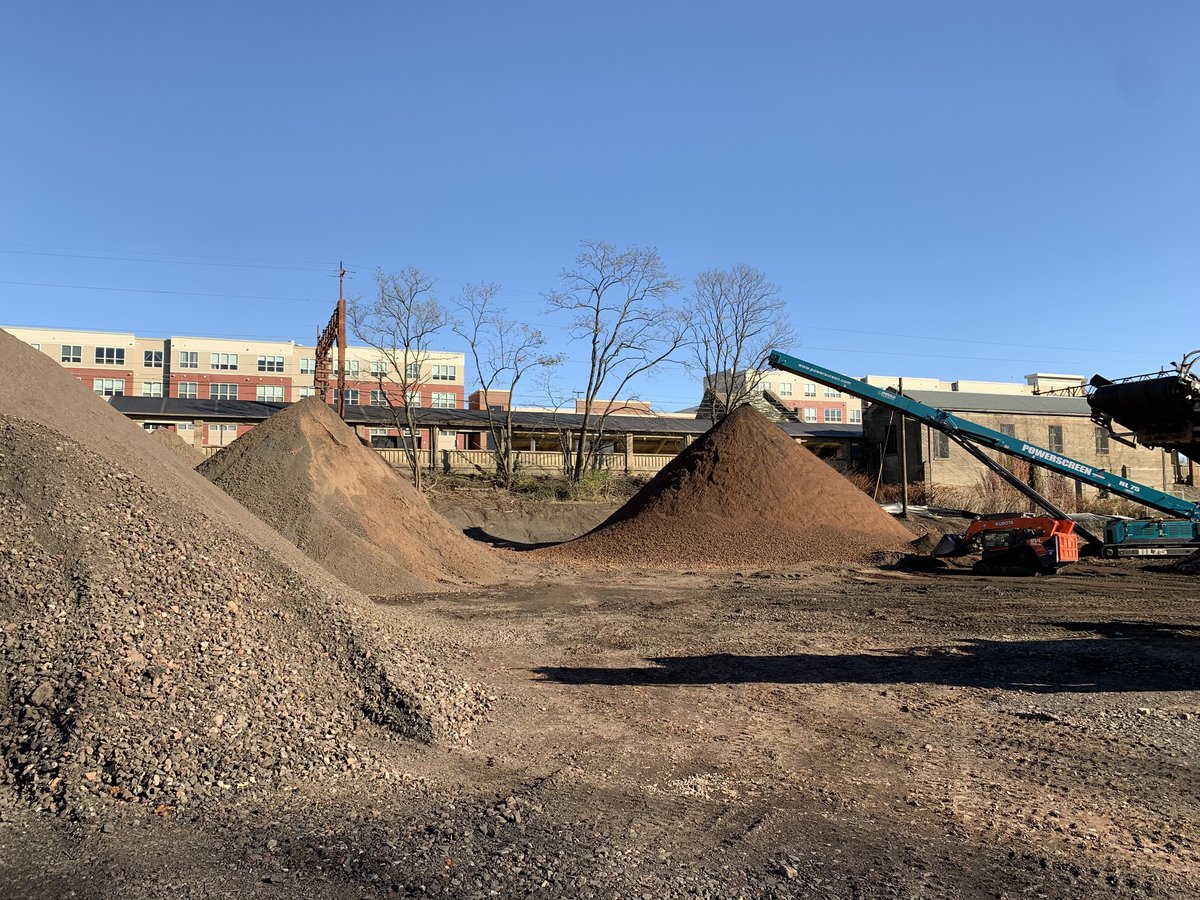 Soil screening / remediation operation underway on site.