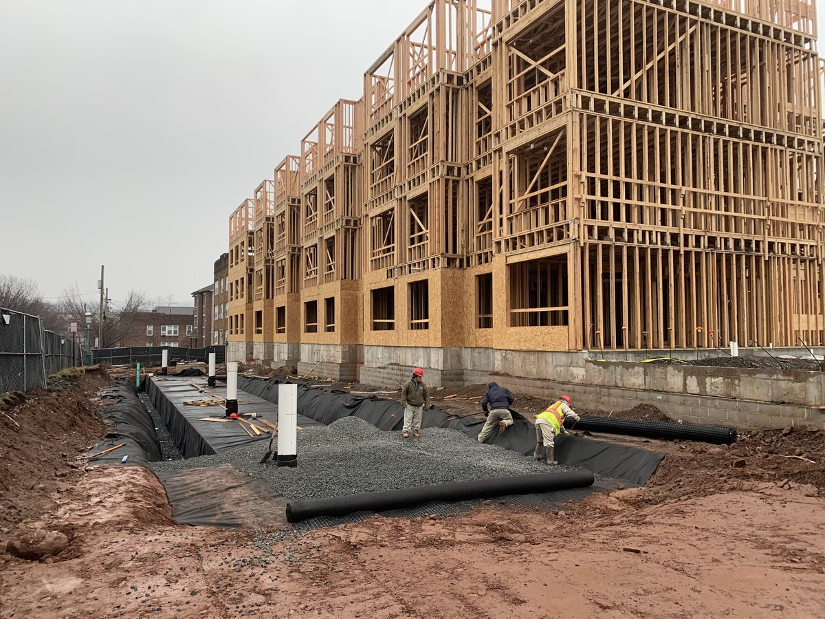 Storm chamber install in the open trench at Clarus Glen Ridge.