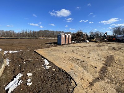 Mass-grading with John Deere fleet at Express Auto Spa.