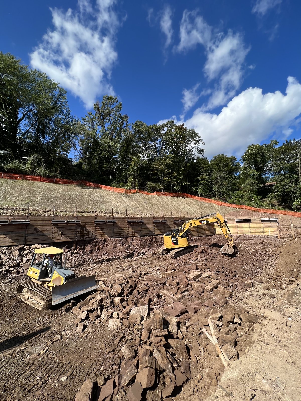 Mass-excavation rock cut — the early earthwork stage of Trojan Storage West Orange.